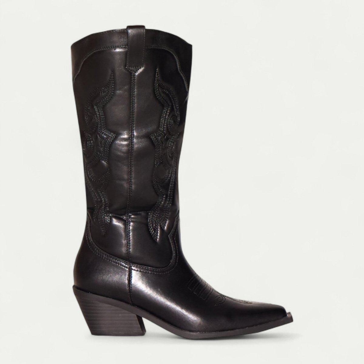 Women's black leather western boots with pointed toe, stitched panels, and stacked heel