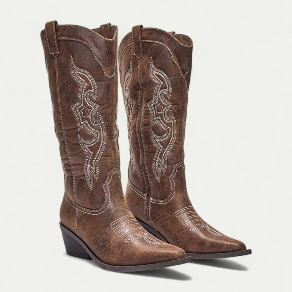 Women's brown suede western boots, pair view, pointed toe with decorative stitched trim
