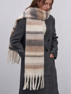 Striped cashmere winter scarf in beige and gray tones, with long fringe ends