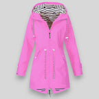 Pink women’s hooded parka with striped hood lining, full zipper, and double waist drawstrings.
