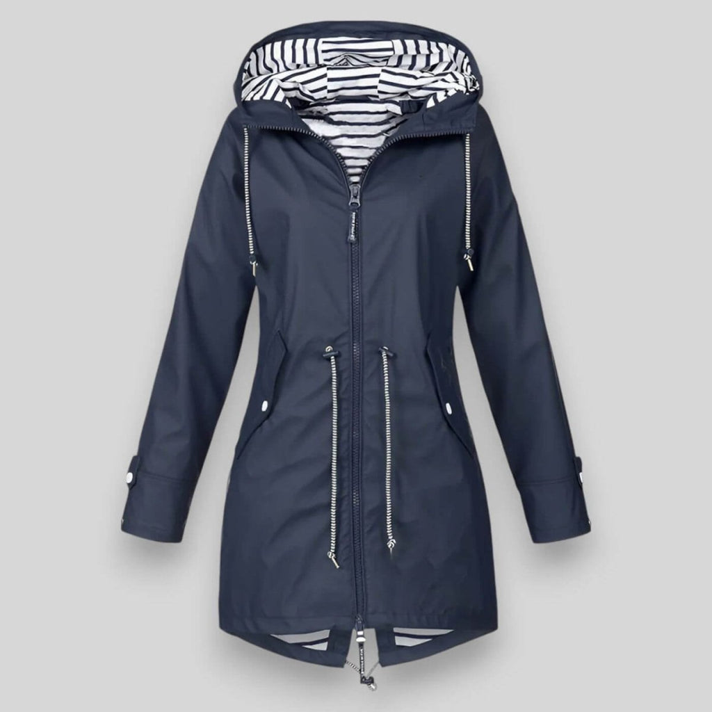 Navy blue women’s insulated parka with striped hood lining and double front zips.
