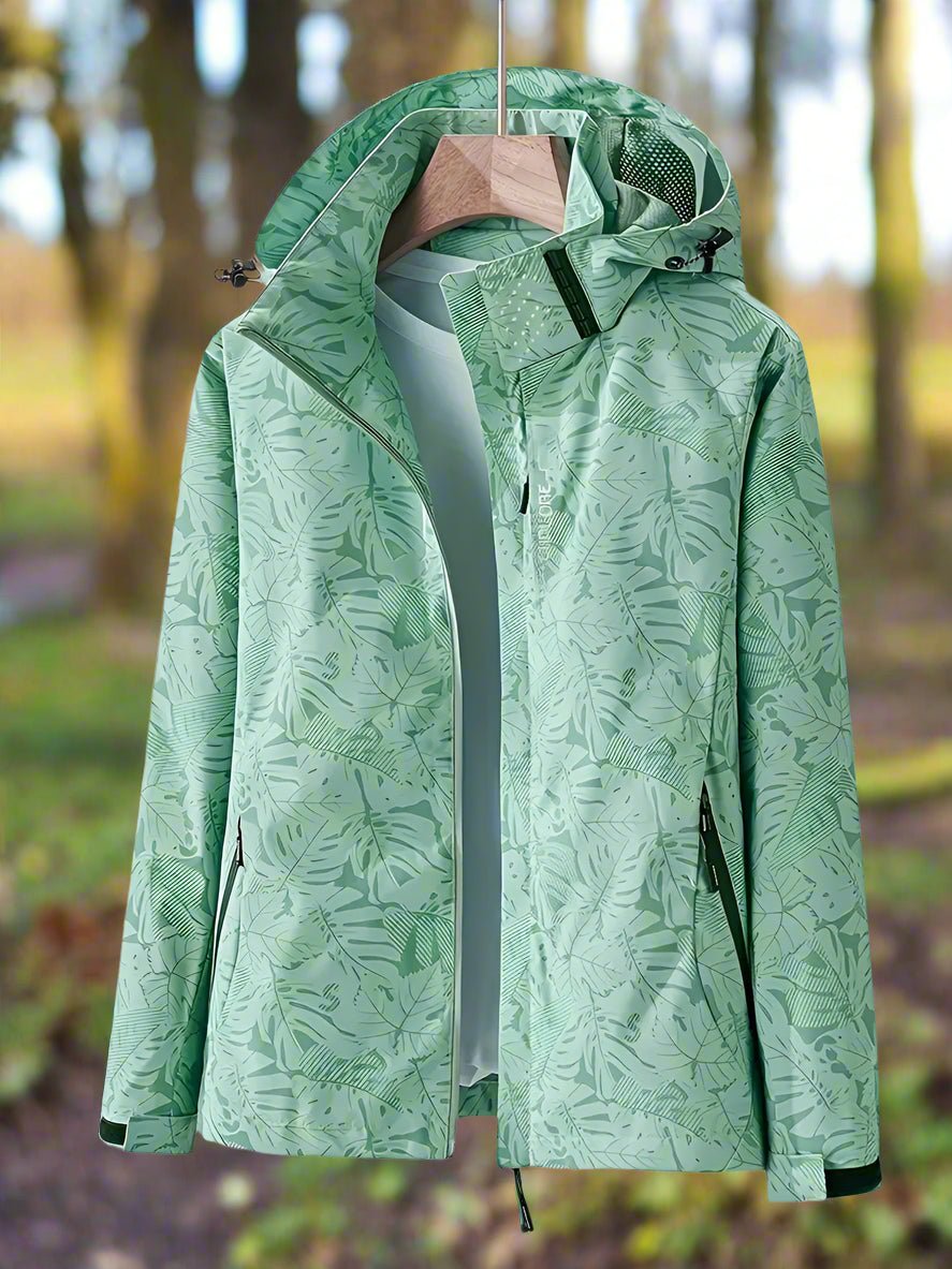 Women’s green hooded jacket with full-length zipper, leaf pattern, drawcord hem