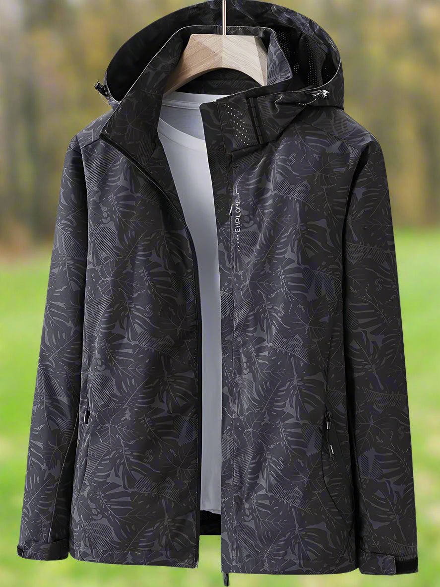 Women’s black hooded jacket with full-length zipper, leaf pattern, drawcord hood