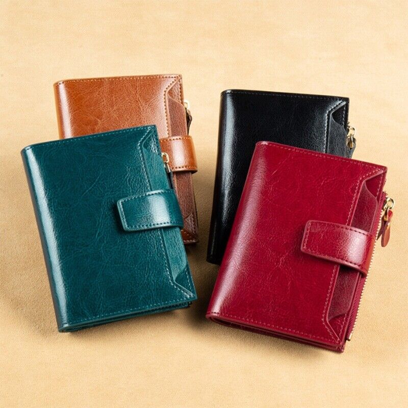 Leather RFID bifold wallet with coin pocket, shown in brown, teal, black, and red