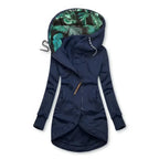 Navy hooded women’s jacket with front zipper, long sleeves, and tropical printed contrast lining