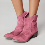 Women’s low-heel slip-on ankle boots in pink suede with side pull tabs