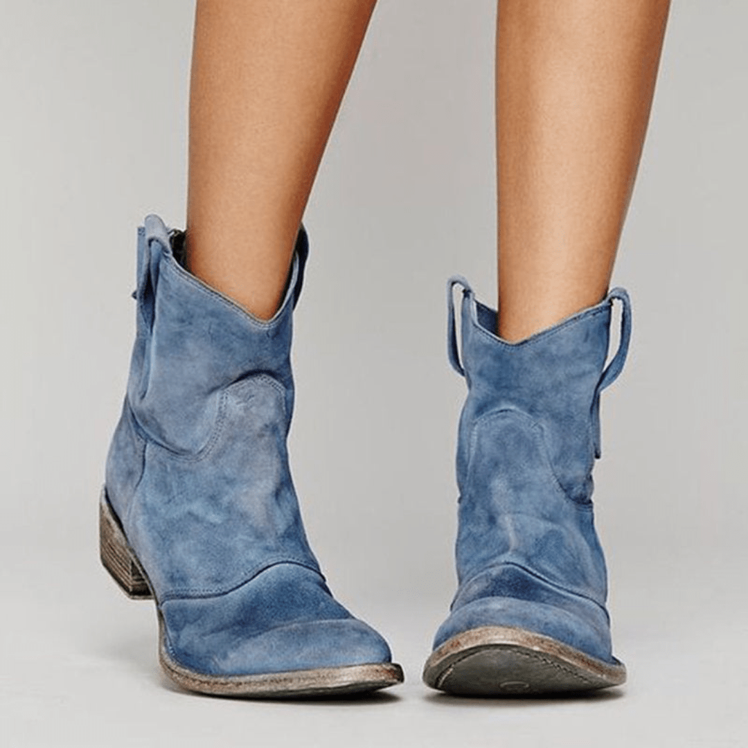 Women’s low-heel slip-on ankle boots in light blue suede with pull tabs