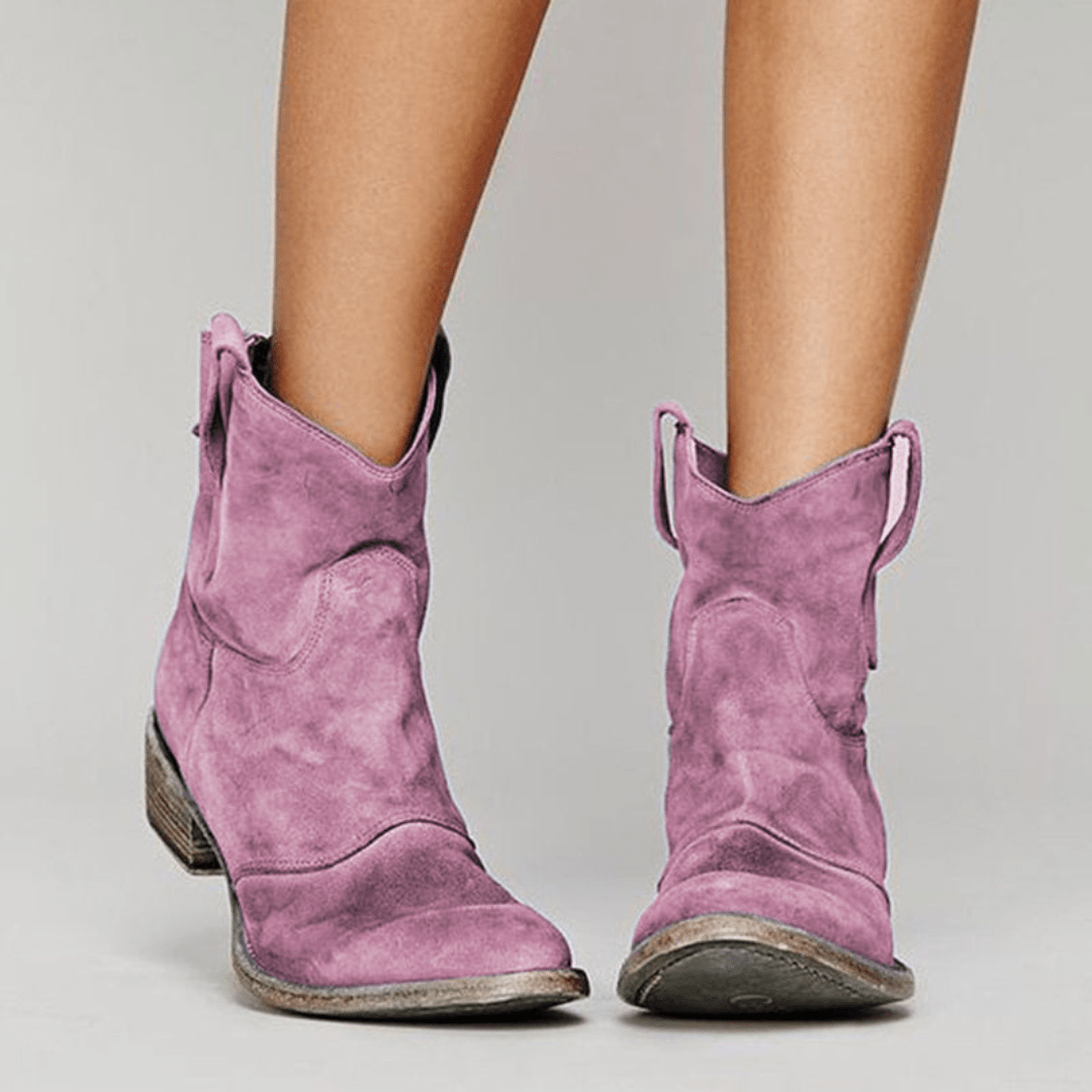 Women’s low-heel slip-on ankle boots in purple suede with pull tabs