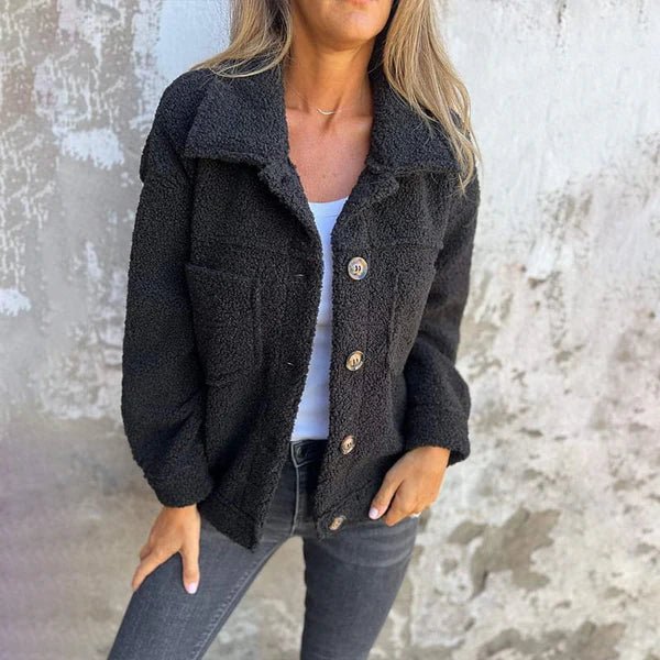 Black women’s cardigan with collared neckline, button front, and long sleeves
