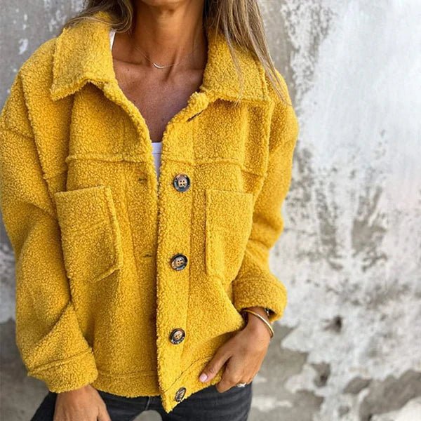 Yellow women’s sherpa cardigan with collared neckline, button front, and patch pockets