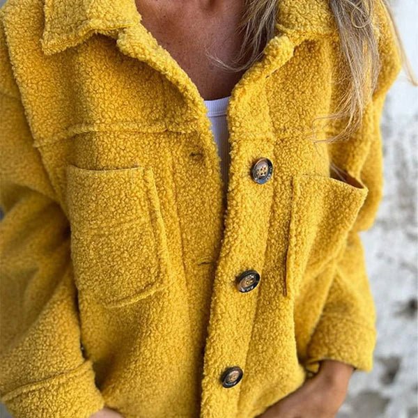 Yellow collared sherpa cardigan with button placket and two chest flap pockets
