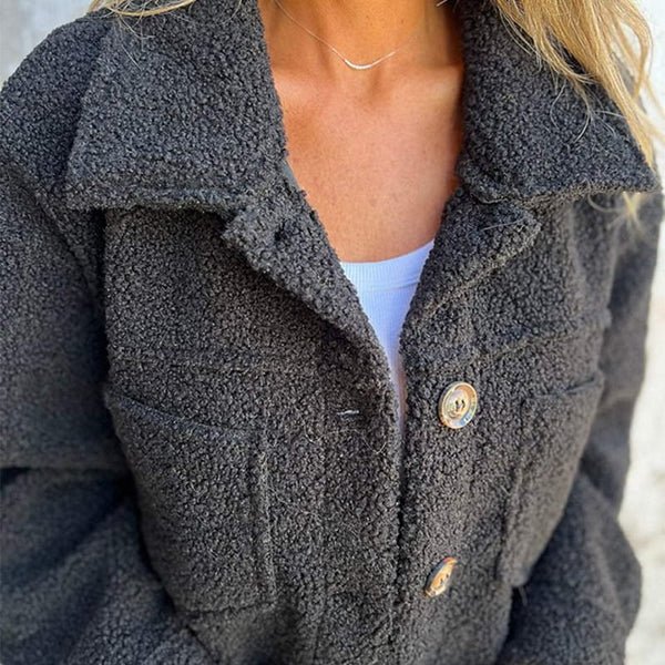 Dark gray women’s sherpa cardigan with collared neckline and button front