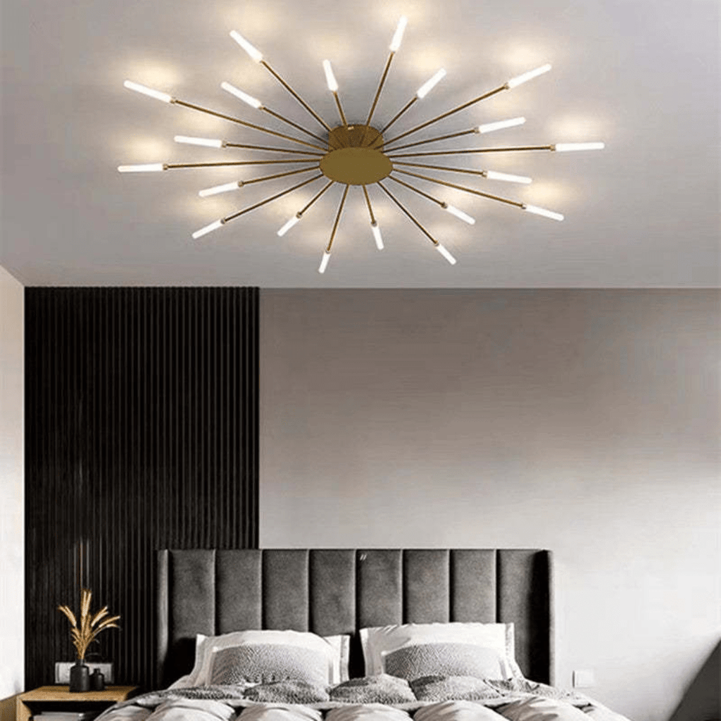 Gold LED flush mount ceiling lamp with radial slim rods and bright illuminated bulbs