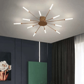 Gold LED flush-mount ceiling lamp with radiating light rods and round base