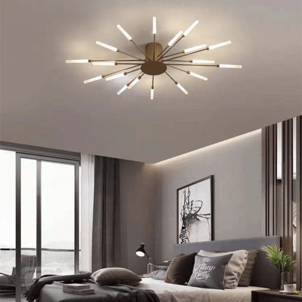 Gold LED flush mount ceiling lamp with radial rod arms and glowing light bulbs