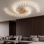 Flush-mount LED ceiling lamp with gold center and radiating slim light bars