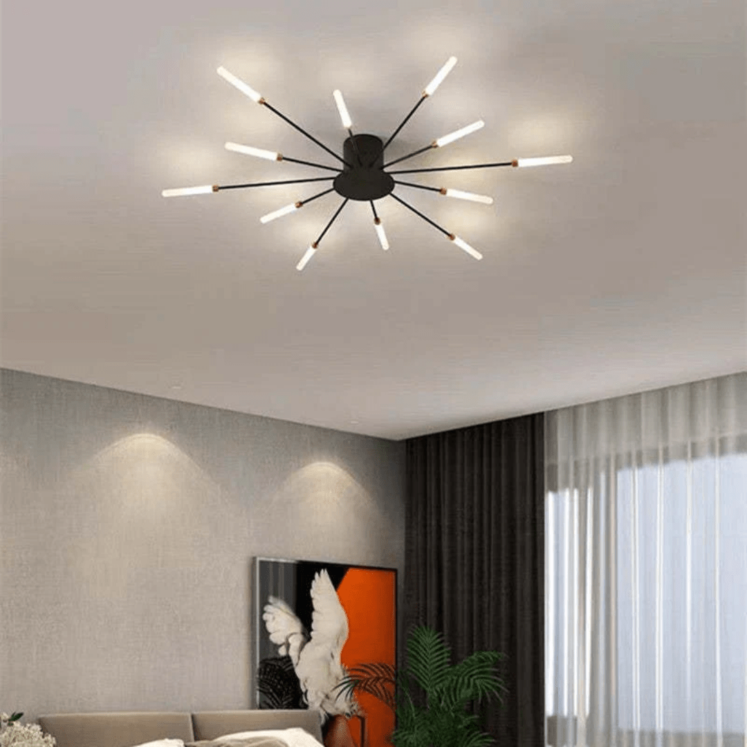 Black LED flush mount ceiling lamp with radial rod arms and glowing light bulbs