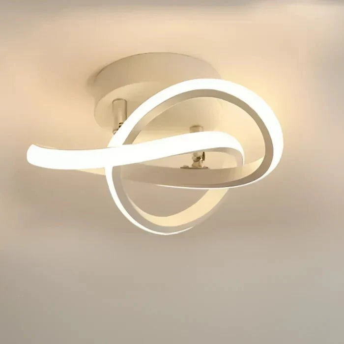 Curved double ring LED flush mount ceiling light, white ring design on light base