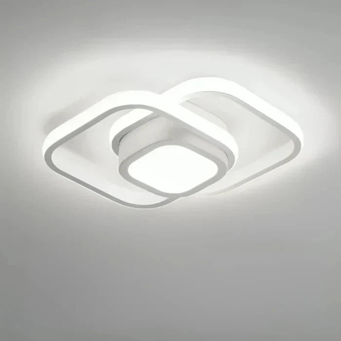 Geometric double ring LED flush mount ceiling light, bright white rings on light surface