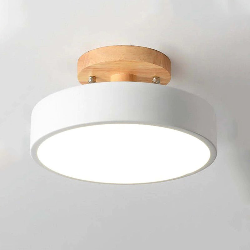 Wood-backed LED flush mount ceiling lamp with white diffuser and bright ring light