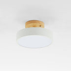 White acrylic LED flush mount ceiling lamp with circular wood backplate