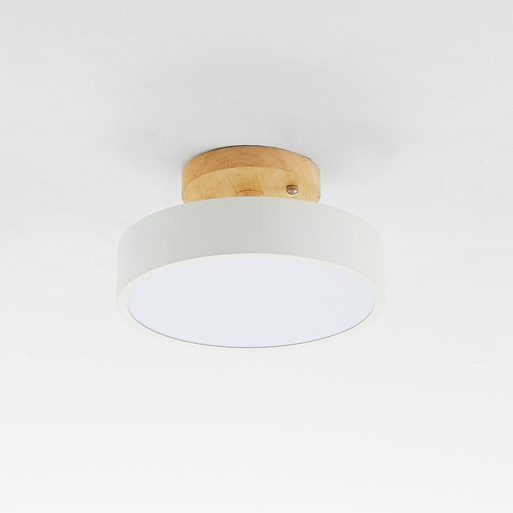 White acrylic LED flush mount ceiling lamp with circular wood backplate