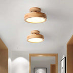 Wood flush mount LED ceiling lamp with warm glow circular diffuser, two lamps visible