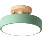 Wood and acrylic flush mount LED ceiling lamp with green shade and bright circular diffuser