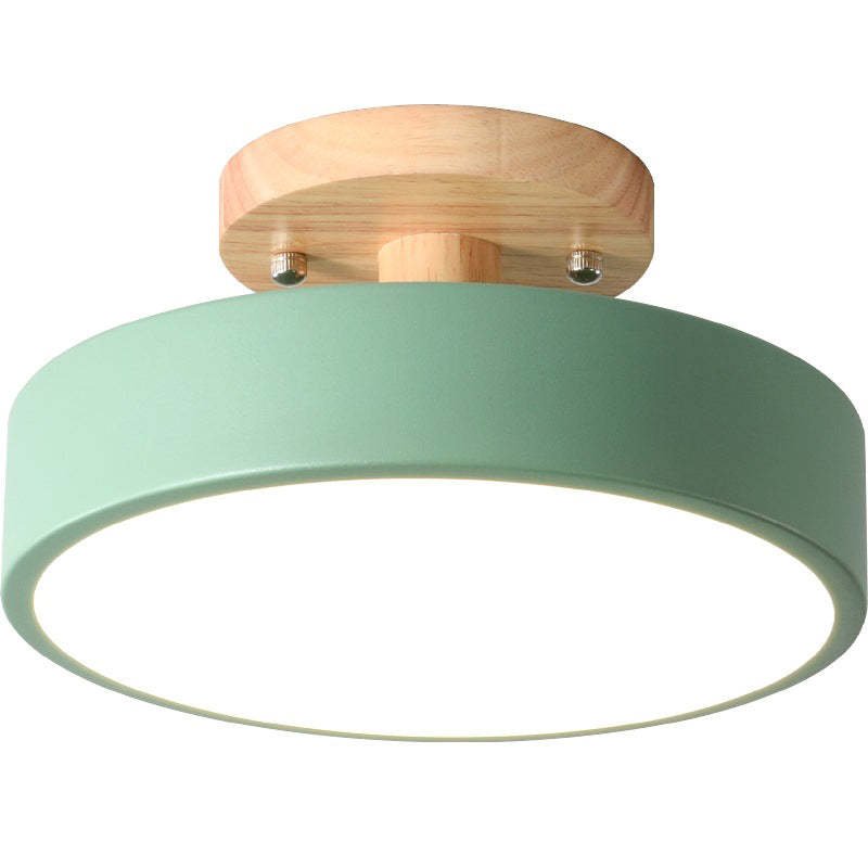 Wood and acrylic flush mount LED ceiling lamp with green shade and bright circular diffuser