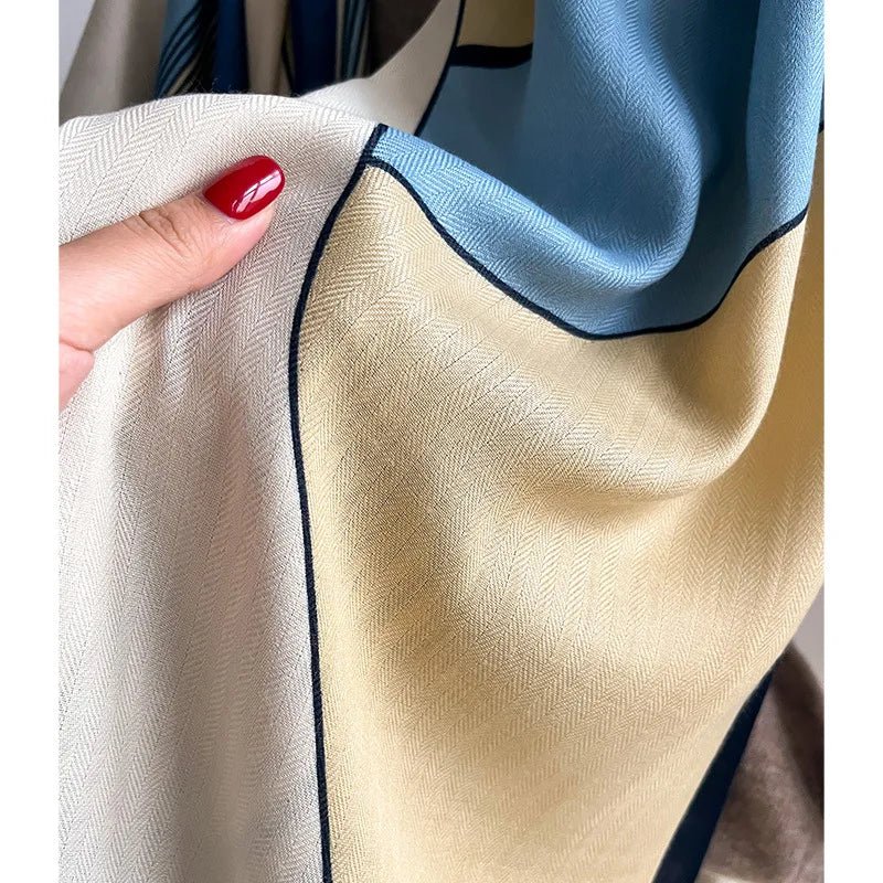 Beige oversized scarf with textured weave and navy edge trim