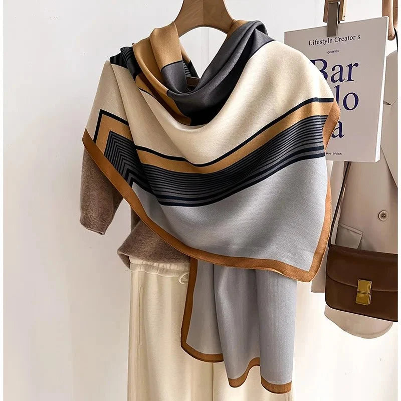 Oversized winter scarf in beige and cream with black striped chevron and tan trim