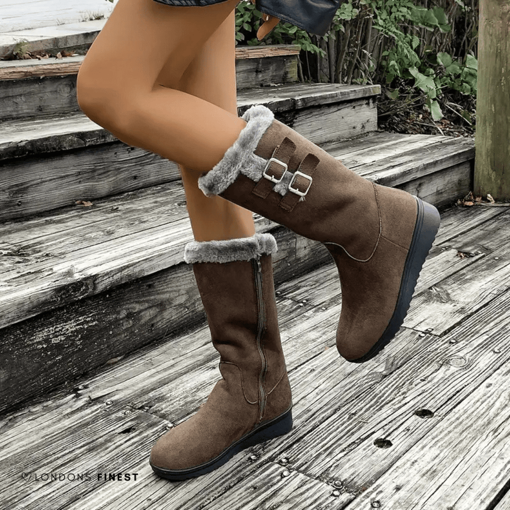 Mid-calf dark brown boots with faux-fur cuff and side double buckles