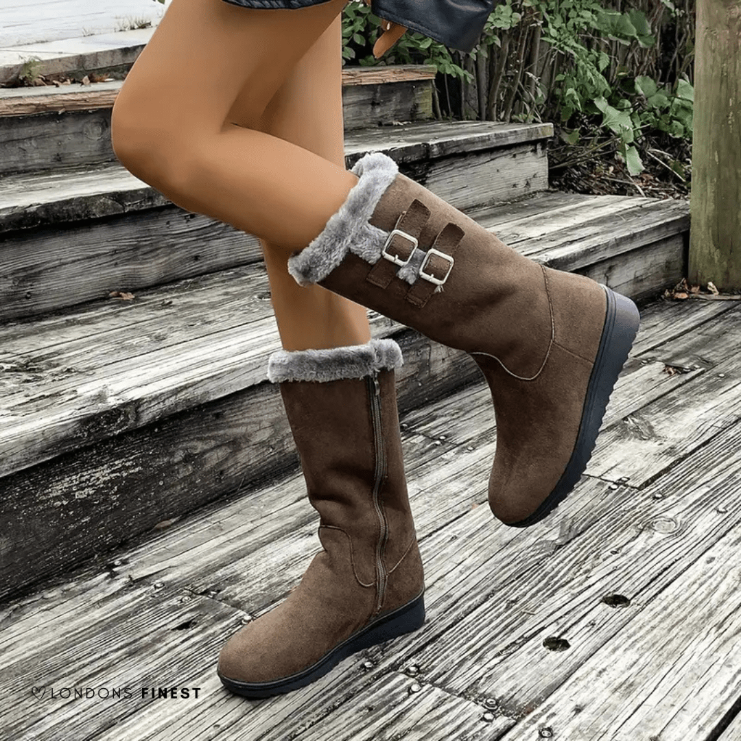 Mid-calf dark brown boots with faux-fur cuff and side double buckles
