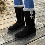 Mid-calf black boots with faux-fur cuff and side double buckles