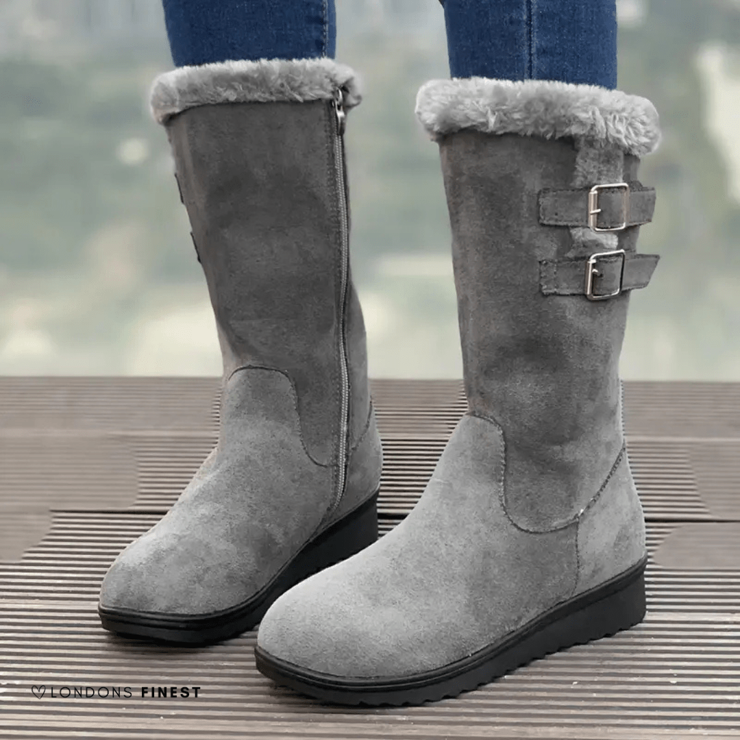 Mid-calf gray boots with faux-fur cuff and side double buckles