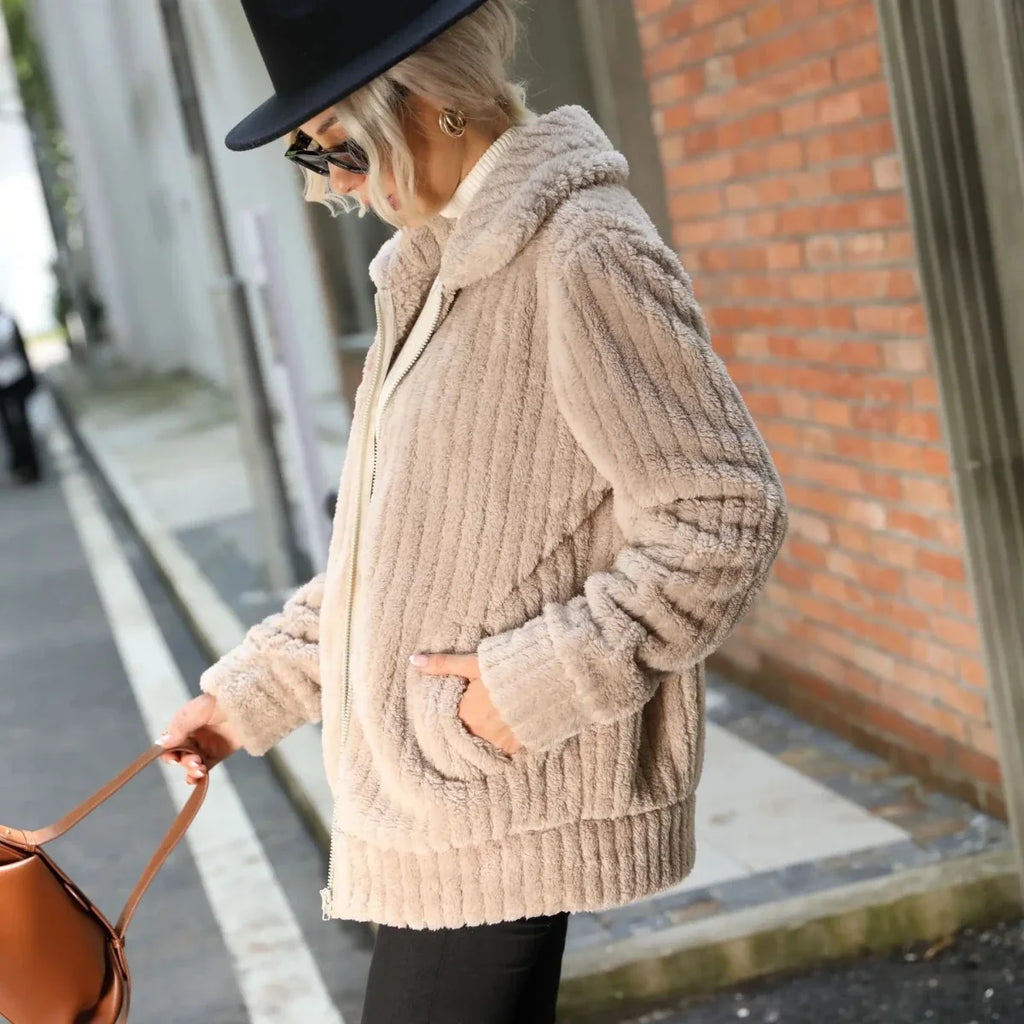 Light beige textured zip-front jacket with stand collar and ribbed cuffs