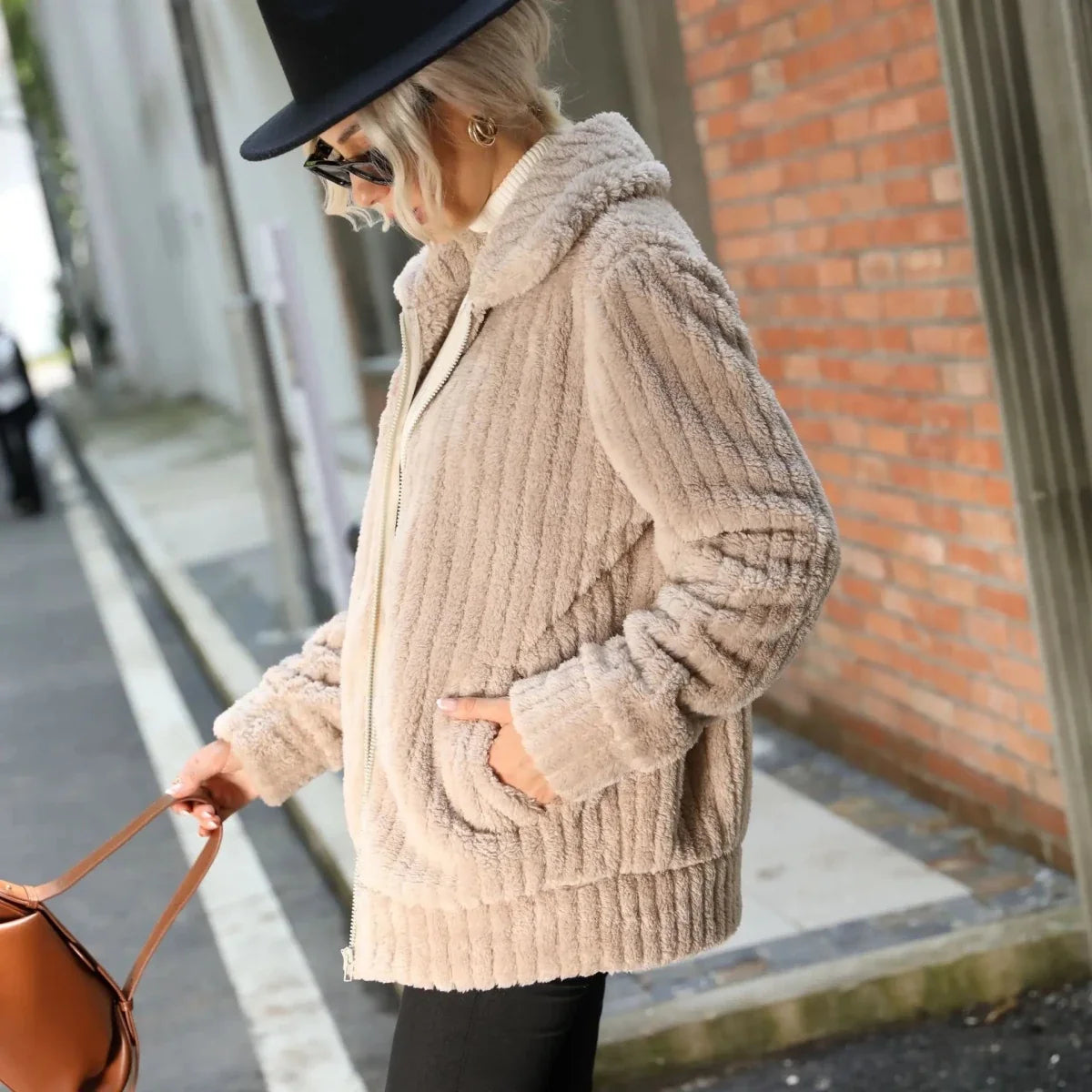 Light beige textured zip-front jacket with stand collar and ribbed cuffs