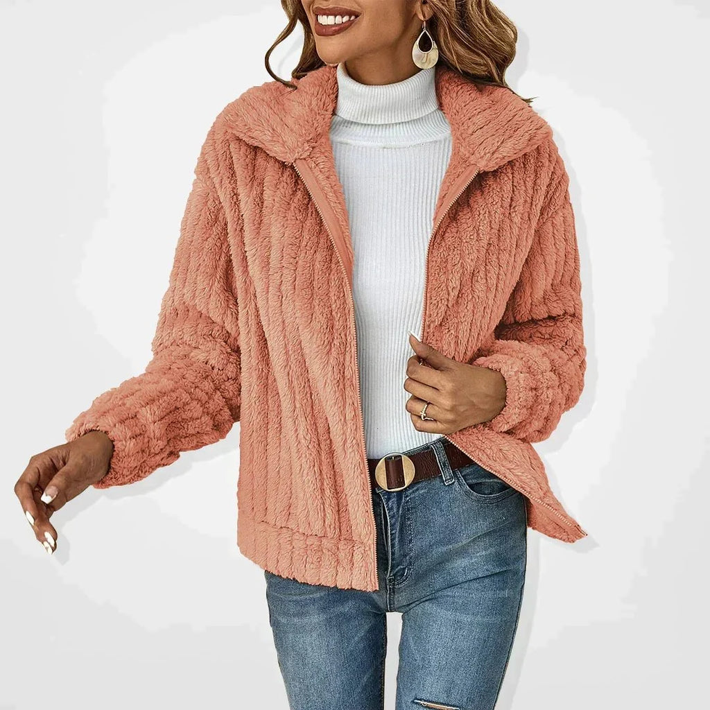 Dusty pink textured zip-front women’s jacket with stand collar and long sleeves