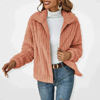 Dusty pink textured zip-front women’s jacket with stand collar and long sleeves