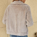 Light beige textured zip-front women’s jacket with stand collar and long sleeves