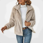 Light gray textured zip-front women’s jacket with stand collar and long sleeves