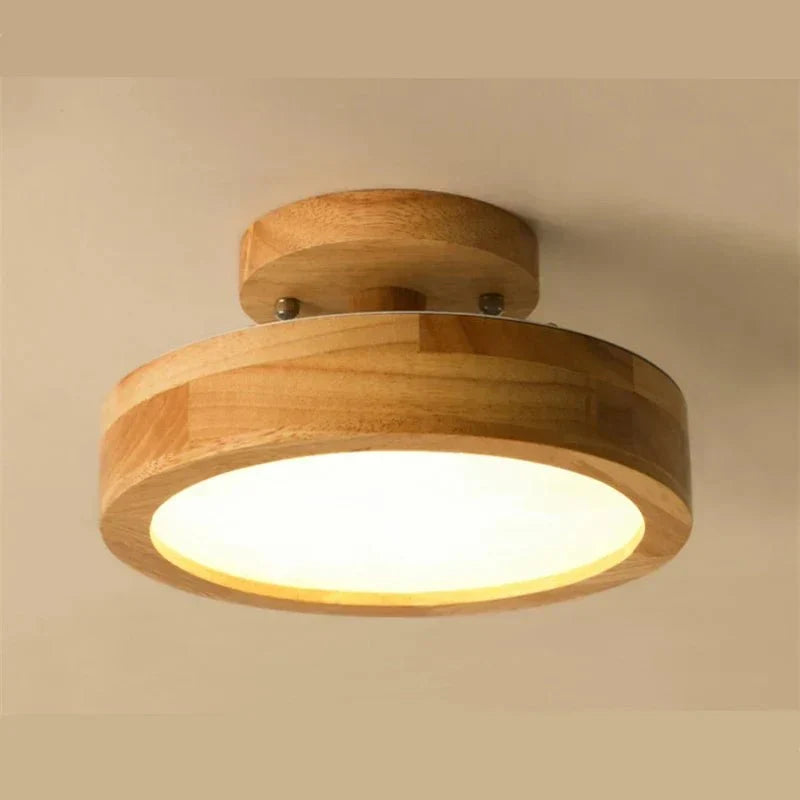 Close view of round solid-wood flush mount LED ceiling lamp with glowing light