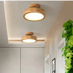 Round wood flush mount ceiling lamp with LED light, mounted on the ceiling