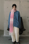 Pink to rose gradient knit scarf wrap with long fringe ends and soft texture