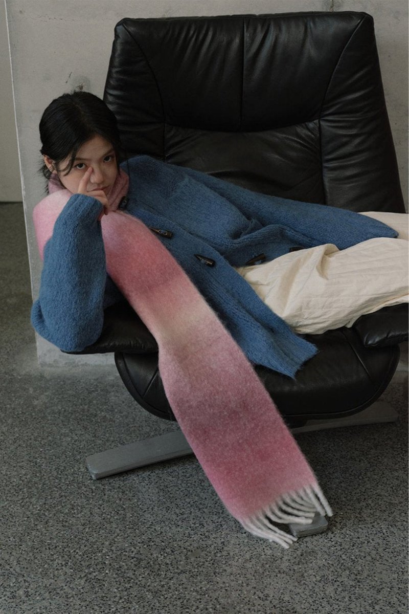 Gradient knit scarf in dusty blue and mauve tones with long fringes