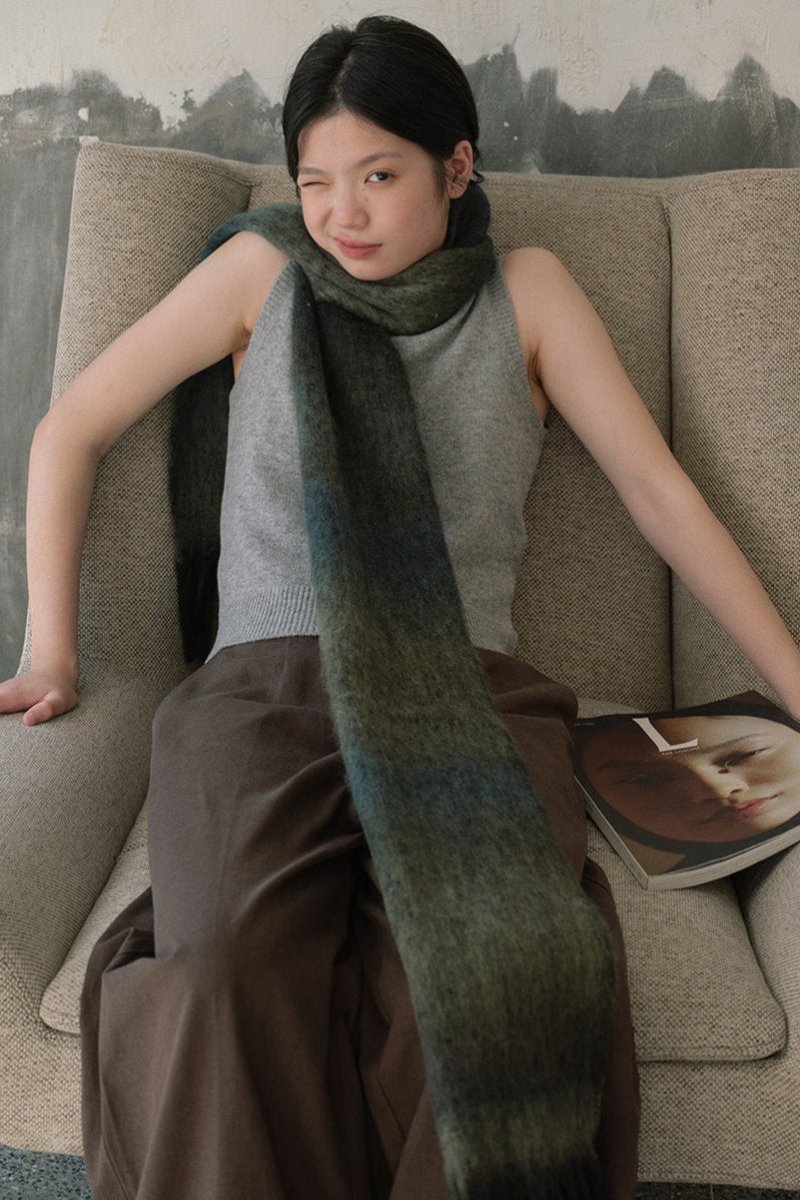 Long knit gradient scarf in olive green and muted gray with fringed ends