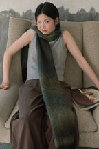 Long knit gradient scarf in olive green and muted gray with fringed ends
