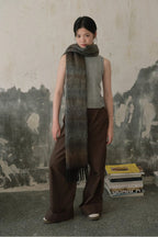 Long knit gradient scarf in dark charcoal to gray with fringed ends