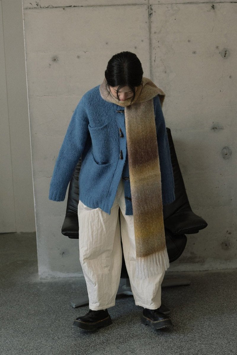 Long gradient knit scarf wrap in blue and olive tones with fringed ends