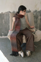 Brown gradient knit scarf with ombre from dark to light and long fringed ends